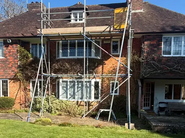 Residential scaffolding installation showing scaffolding around a house